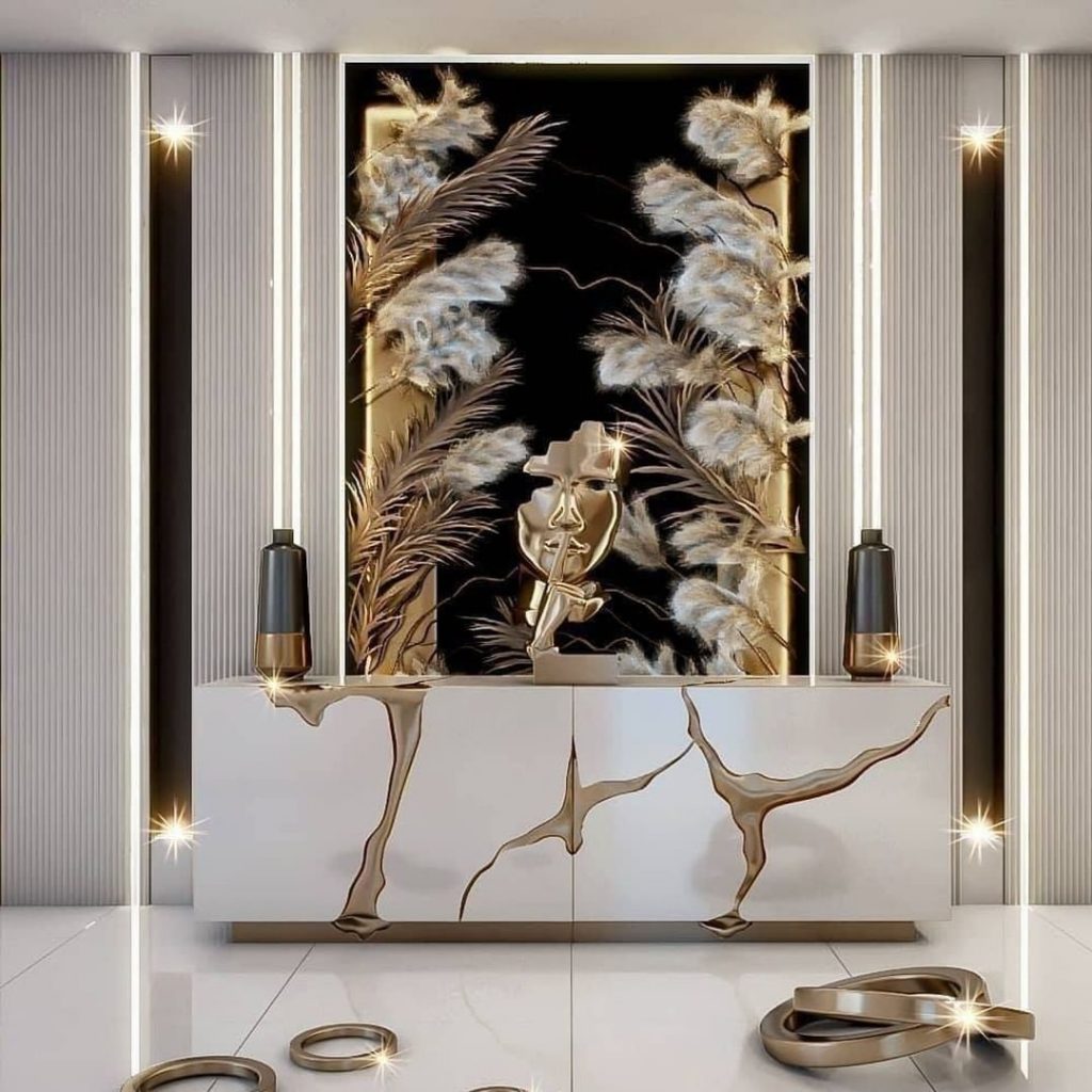 modern contemporary entryway with white and gold sideboard