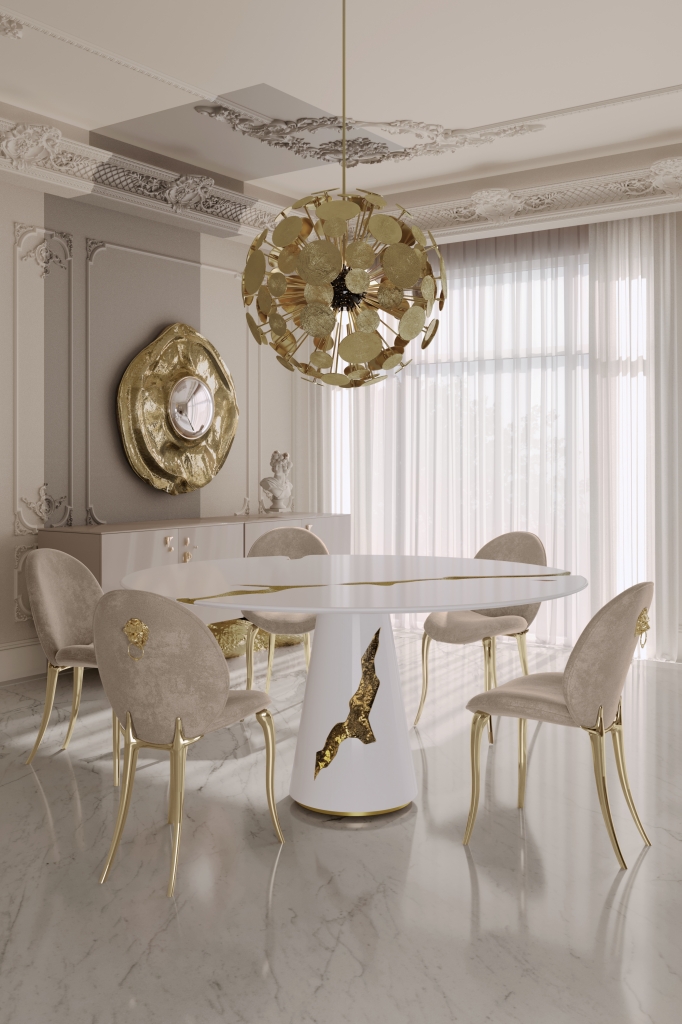 Gold Furniture- white dining table with gold details, beige dining chairs, gold mirror and gold chandelier