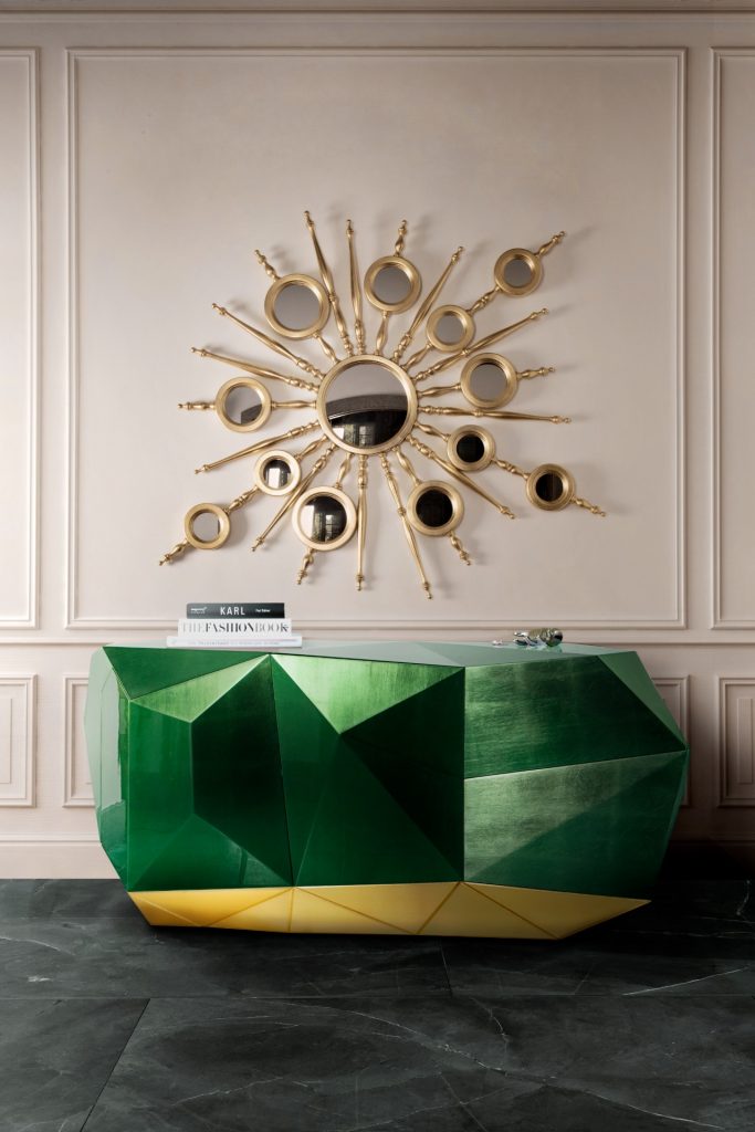 green and gold sideboard and gold mirror in the wall