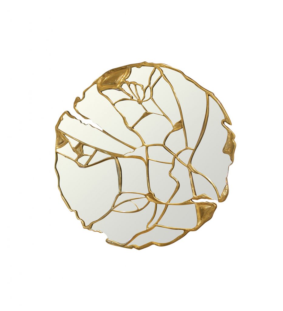 Sarah-Z-Designs - Round mirror with gold details on the wall