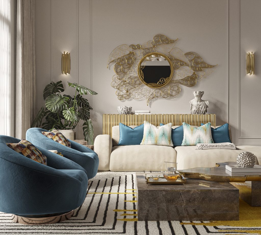 luxury houses - luxury living room with a nude sofa, two blue armchairs, a marble center table, a gold sideboard and a filigree mirror