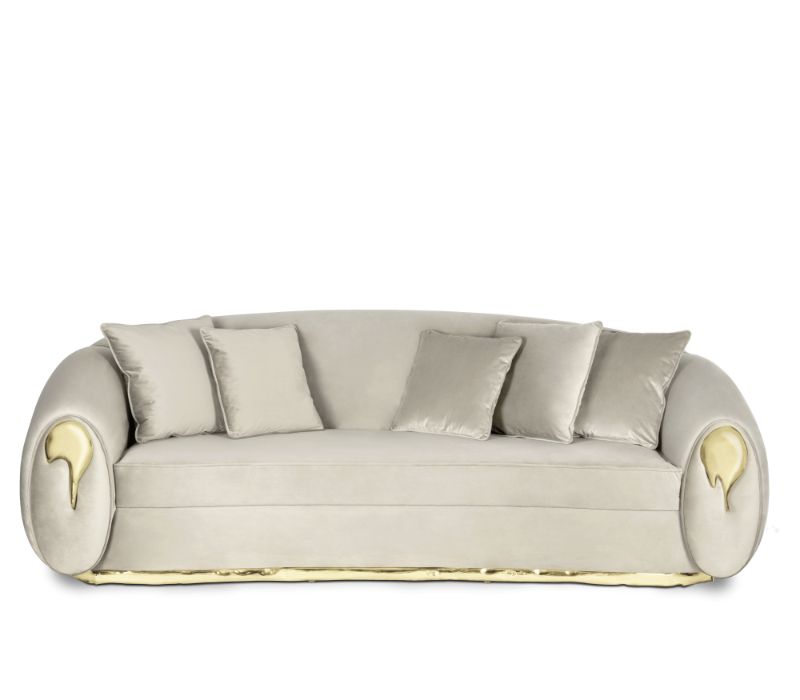 Luxury Living Room Sets - Sofa with gold details in both arms and a gold base in brass finish.